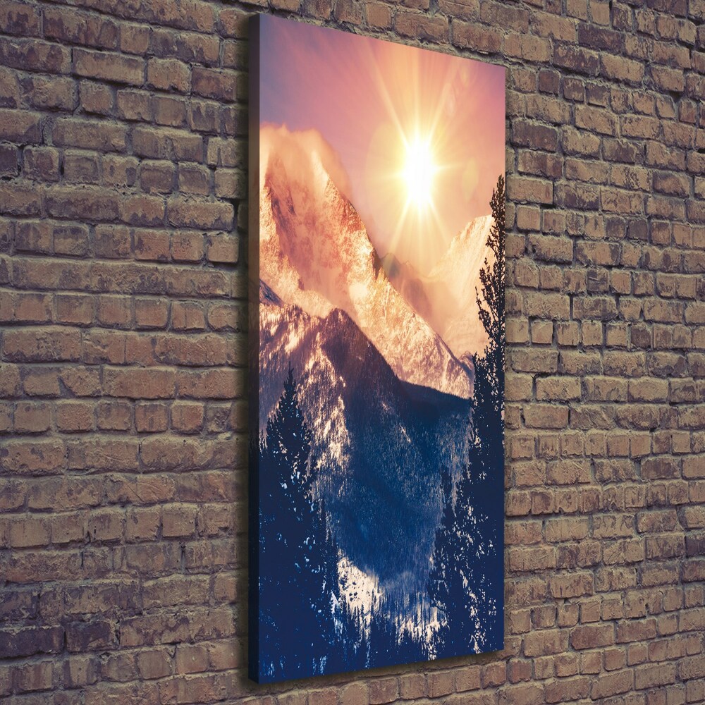 Foto obraz na płótnie pionowy Słońce nad górami
