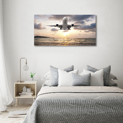 Foto obraz szklany Samolot nad morzem