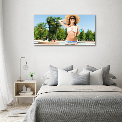 Foto-obraz szklany Kobieta nad basenem