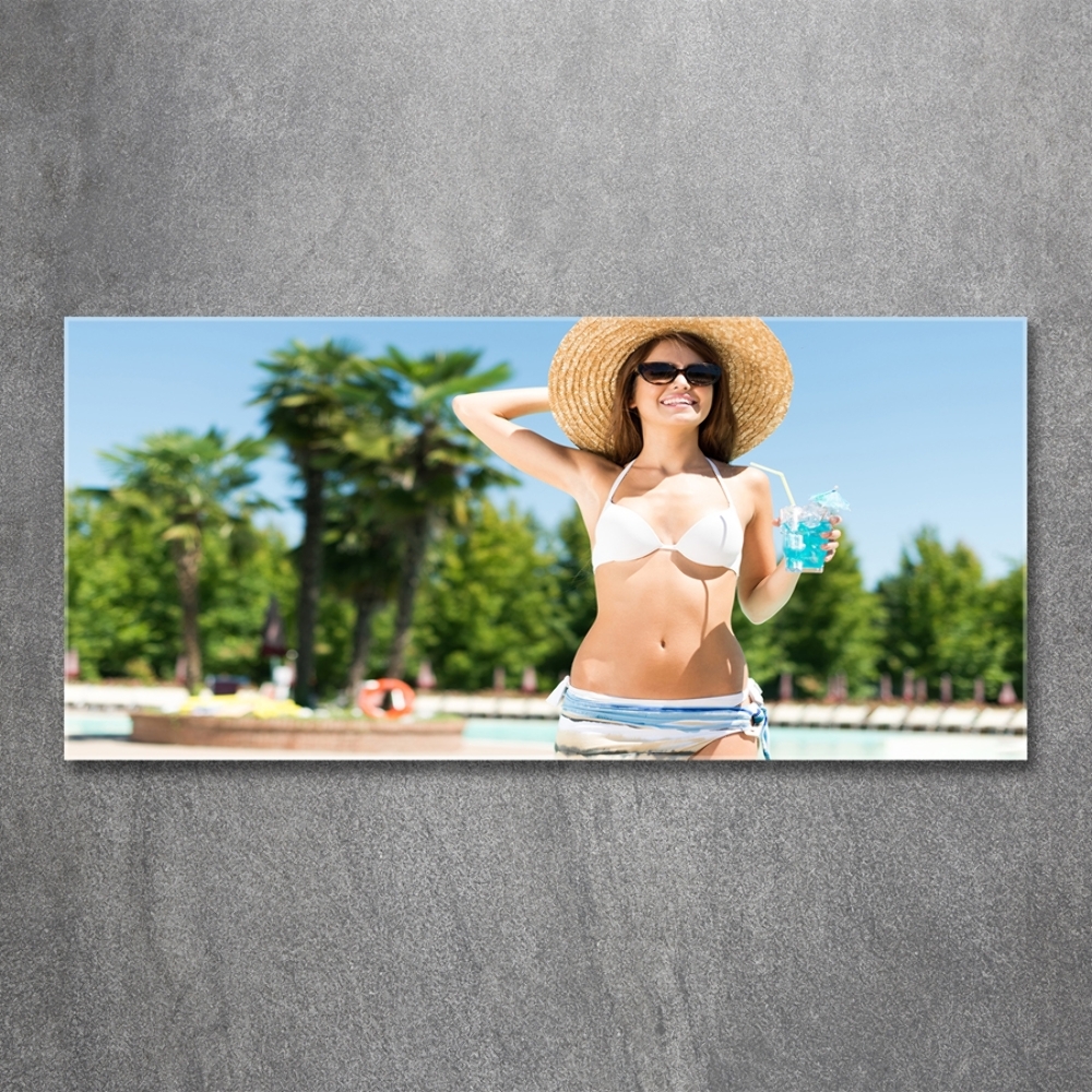Foto-obraz szklany Kobieta nad basenem