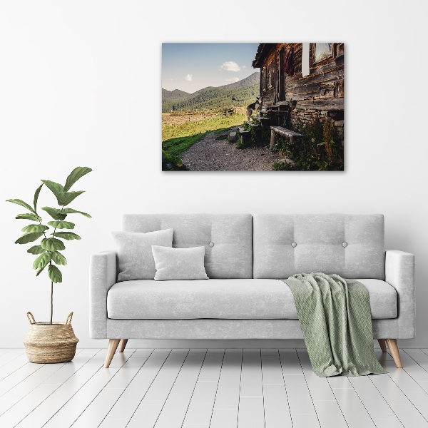 Foto obraz szklany Drewniany dom góry