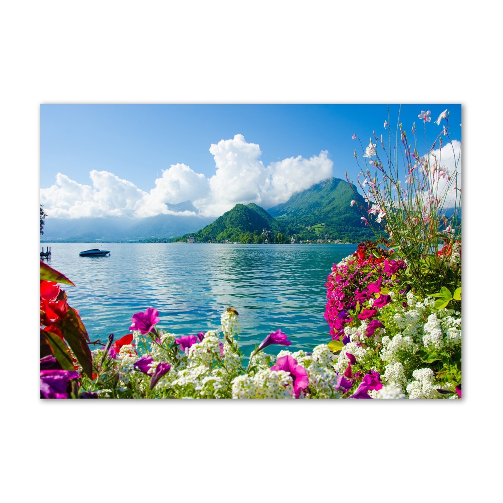 Foto obraz szklany Kwiaty nad jeziorem