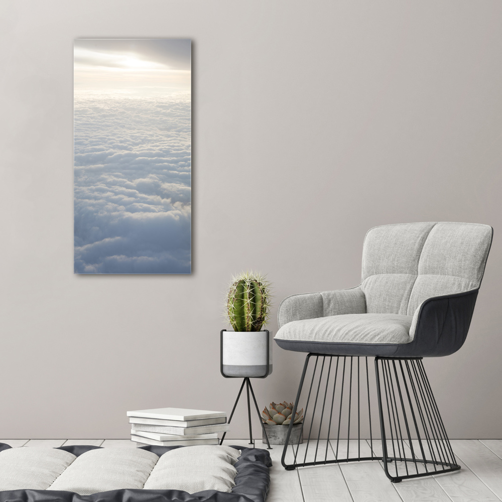 Foto obraz szklany pionowy Lot nad chmurami