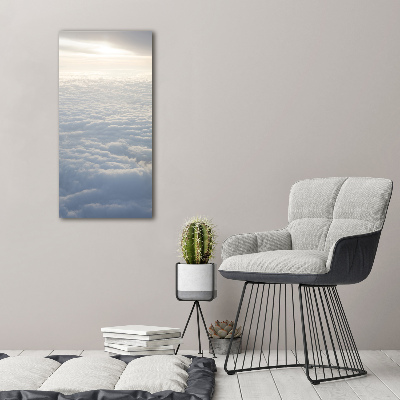 Foto obraz szklany pionowy Lot nad chmurami