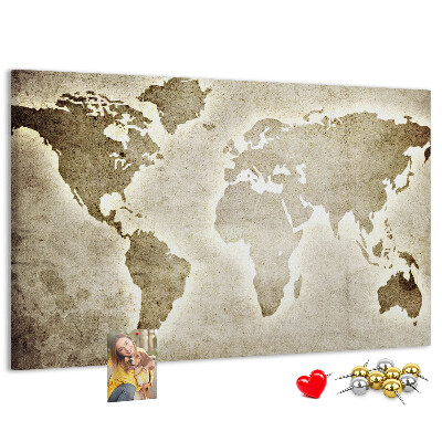 Tablica korkowa Staroświecka mapa świata na tle.