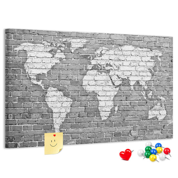 Tablica korkowa Mapa świata na ceglanej ścianie