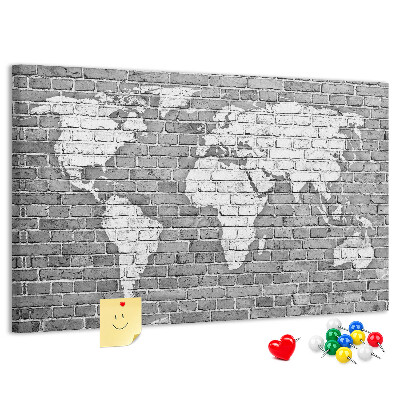 Tablica korkowa Mapa świata na ceglanej ścianie