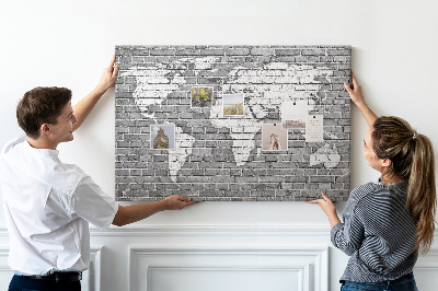 Tablica korkowa Mapa świata na ceglanej ścianie