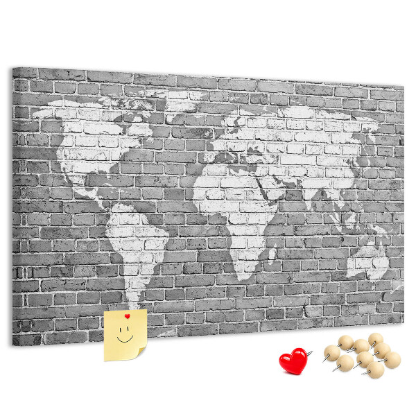 Tablica korkowa Mapa świata na ceglanej ścianie
