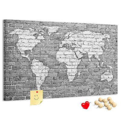 Tablica korkowa Mapa świata na ceglanej ścianie