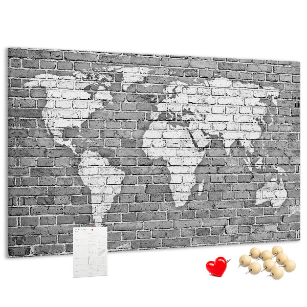 Tablica korkowa Mapa świata na ceglanej ścianie