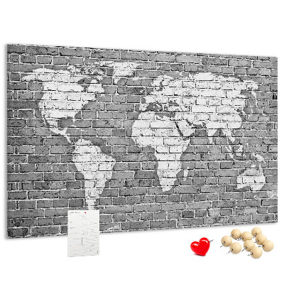 Tablica korkowa Mapa świata na ceglanej ścianie