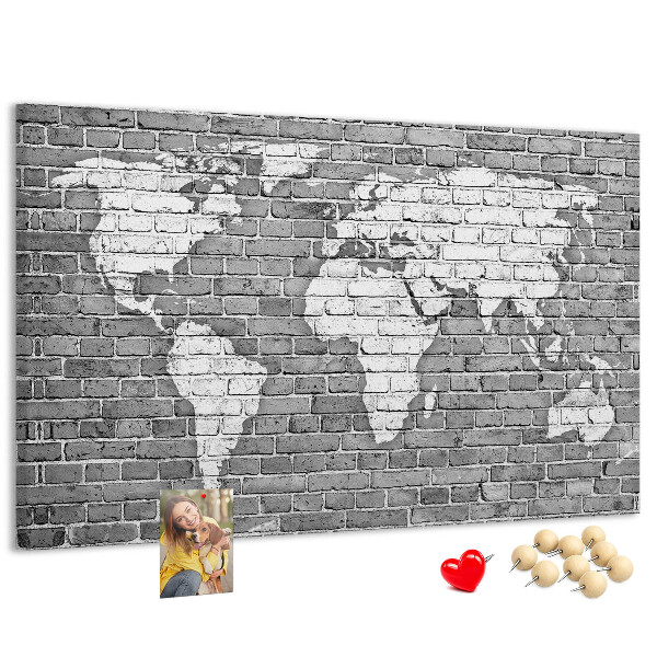 Tablica korkowa Mapa świata na ceglanej ścianie